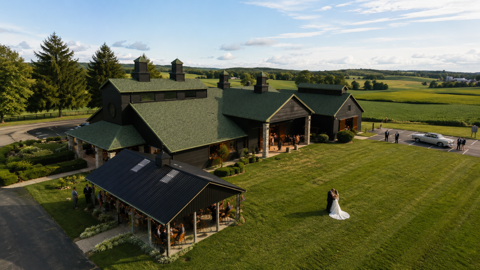 Bride and groom on the lawn at The Show Barn
