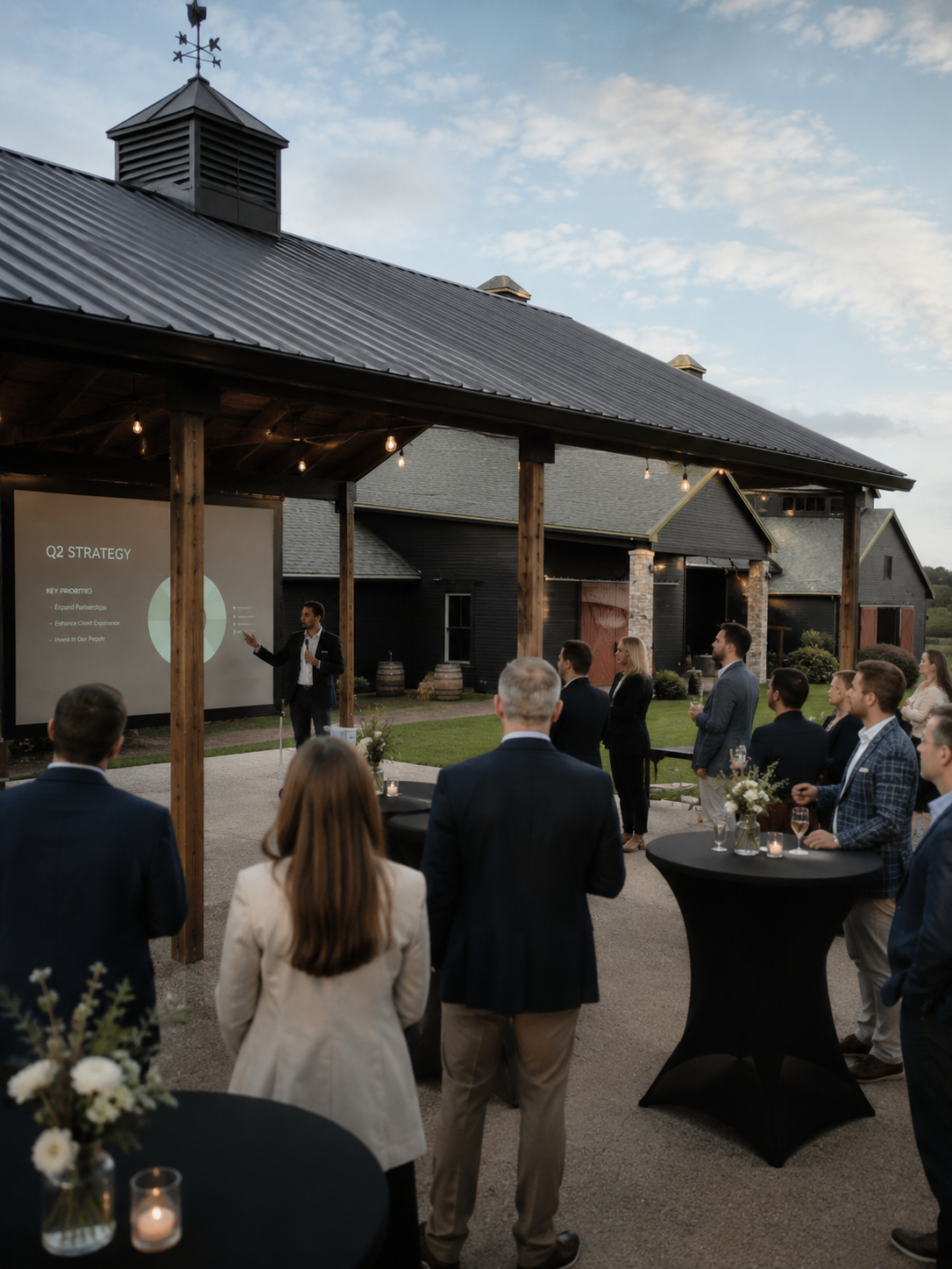 Guests gathered under the pavilion for a corporate event at The Show Barn